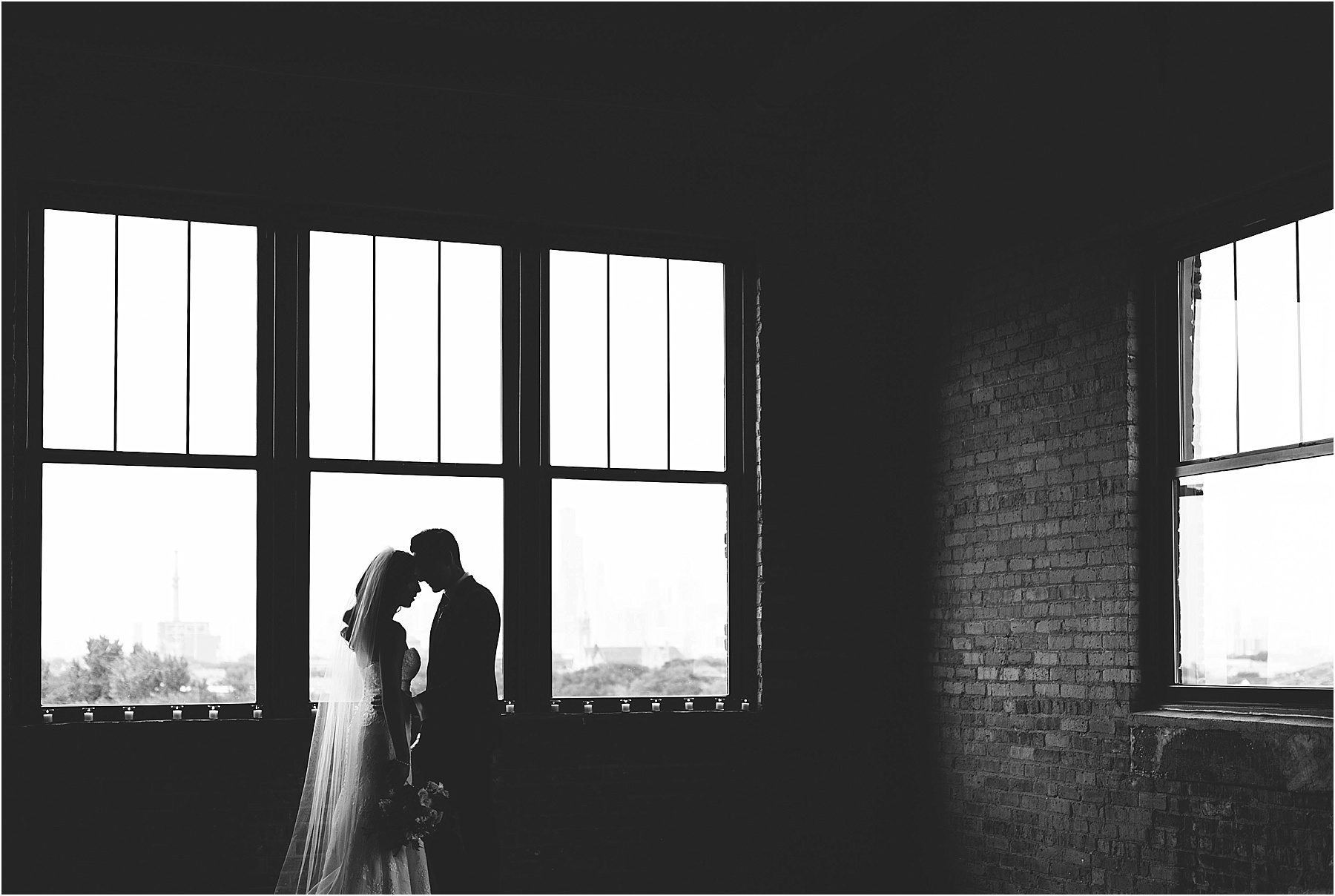 bride and groom at chicago skyline loft