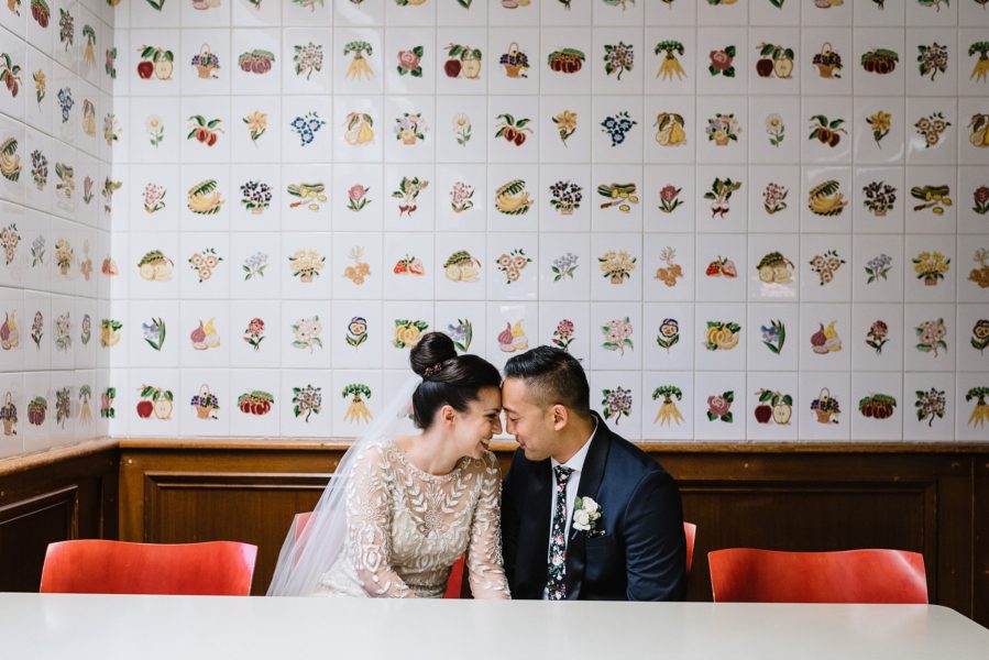 Wedding portrait in front of fruit tile