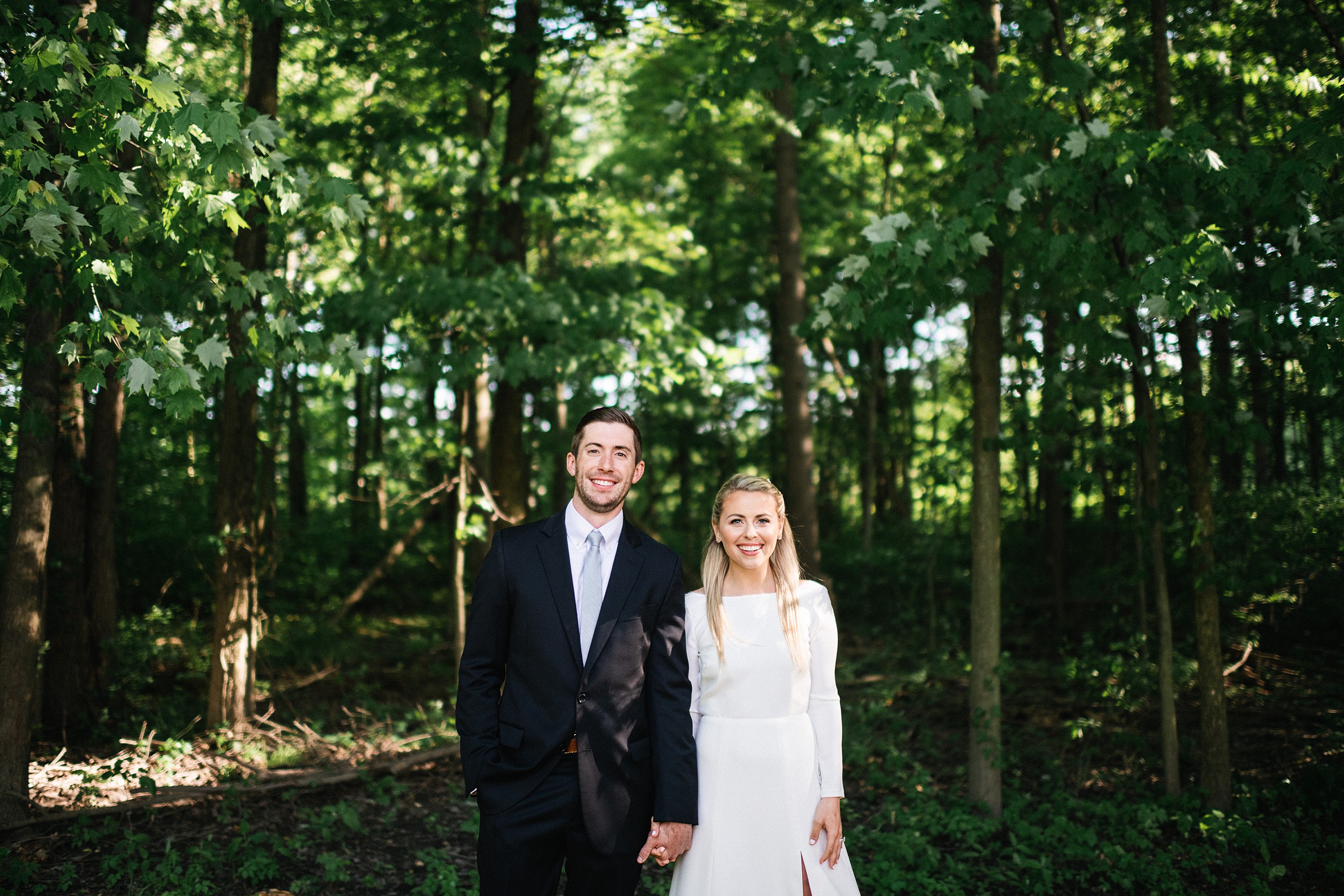 wedding portrait of couple in woods