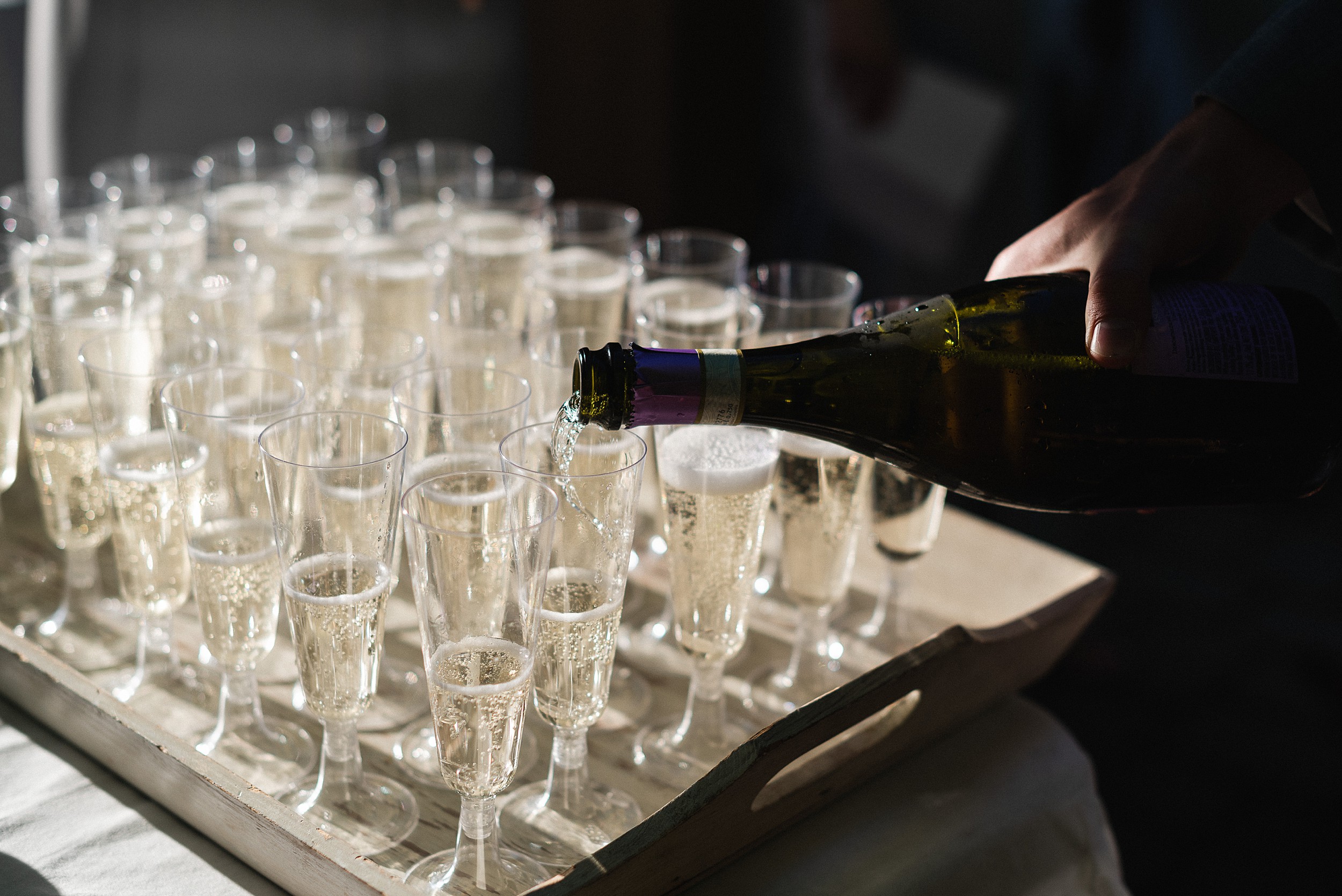 champagne pouring at wedding